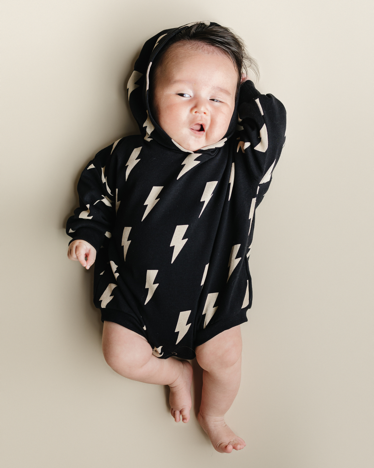 Hooded Bubble Romper | Black Bolts - HoneyBug