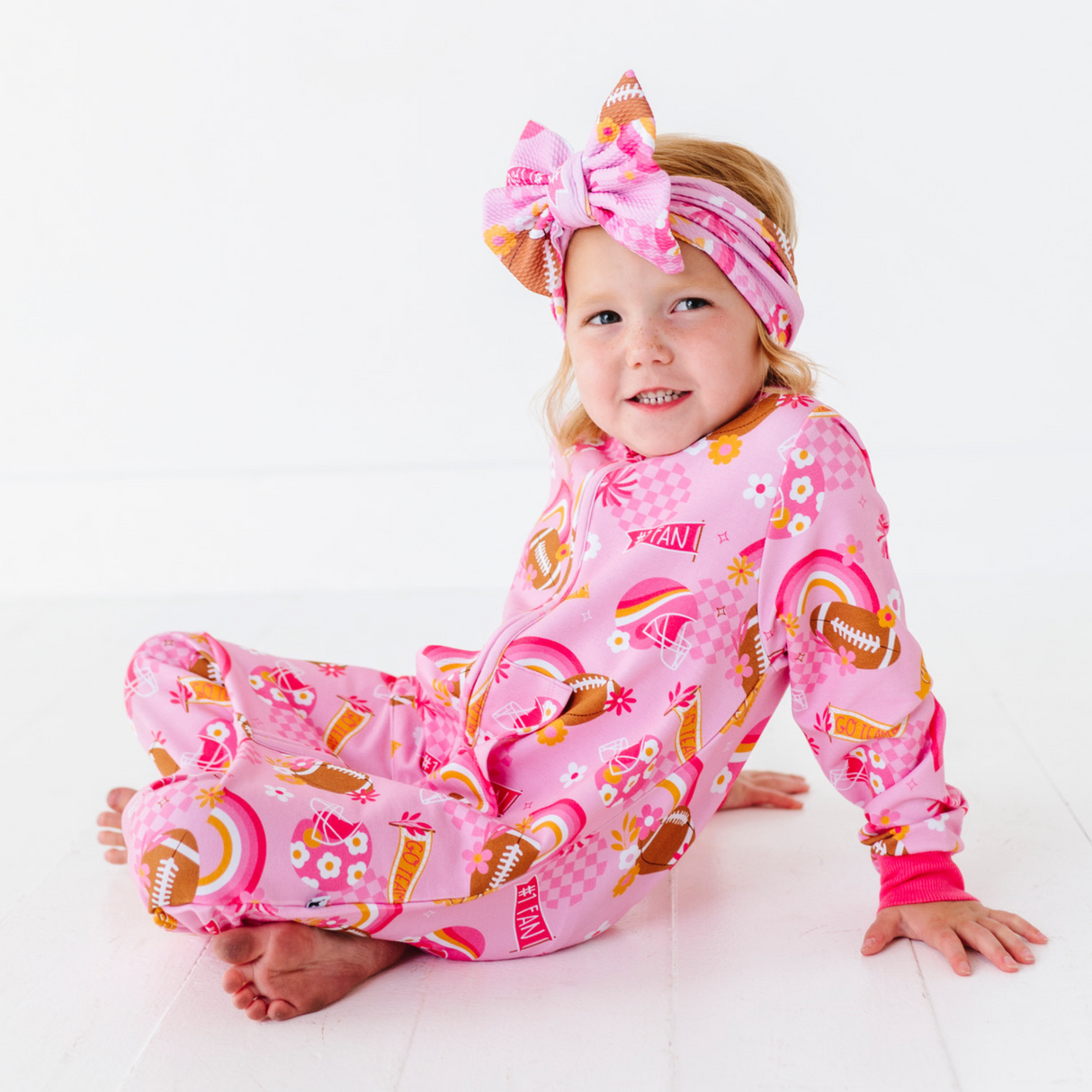 On Game Days We Wear Pink Biggie Bow - HoneyBug