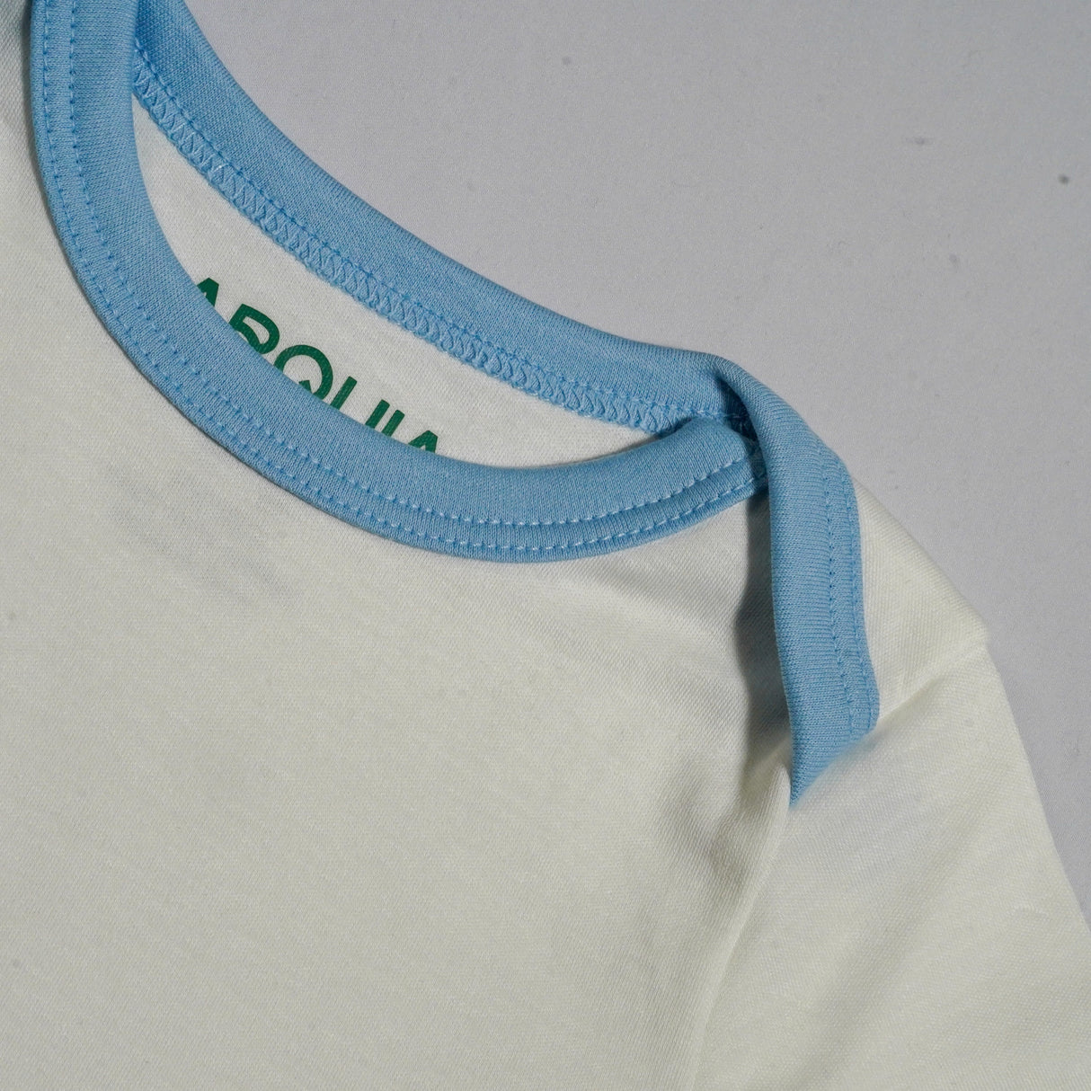 100% Peruvian Pima Cotton White with Chambray Blue Long Sleeve Snap Bodysuit - HoneyBug 